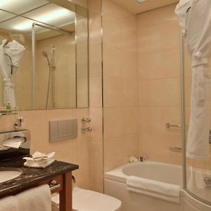 Suite met een Queen Size Bed